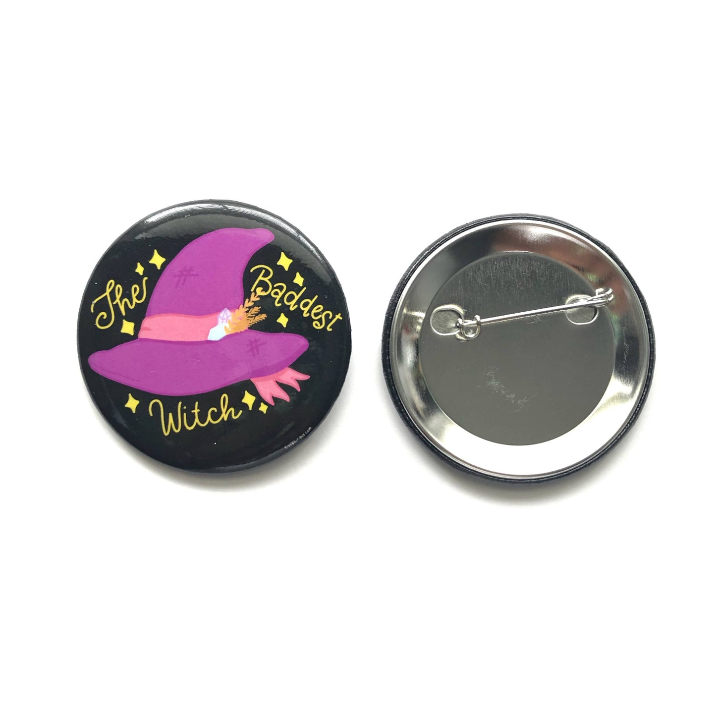 Button badge with witch design and text on a white background