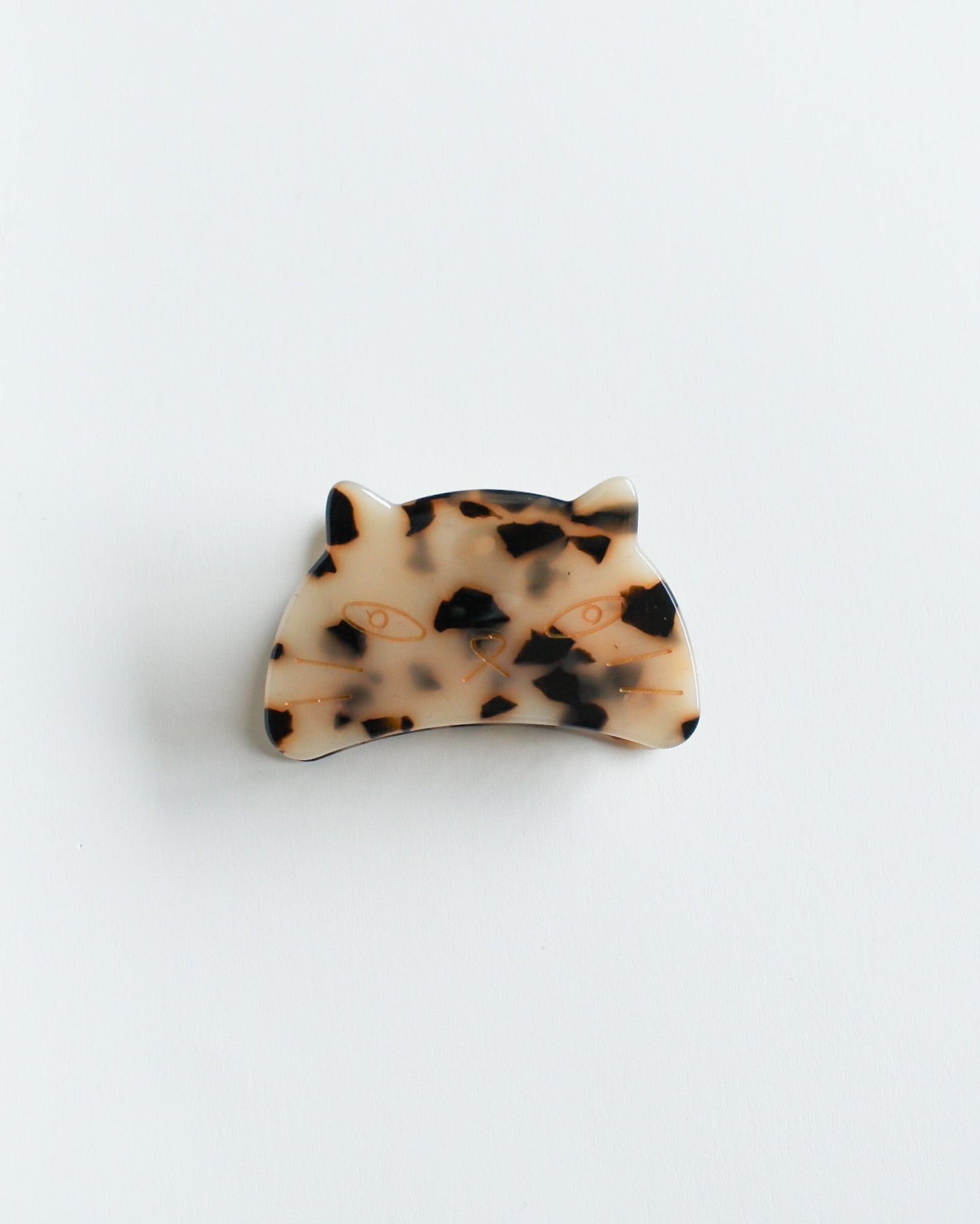 Cat Hair Claw Clip Tortoiseshell-patterned hair clip on a white background