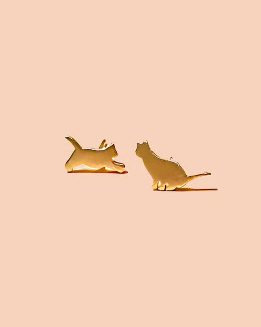 Gold cat-shaped earrings on a beige background, Cat Stud Earrings