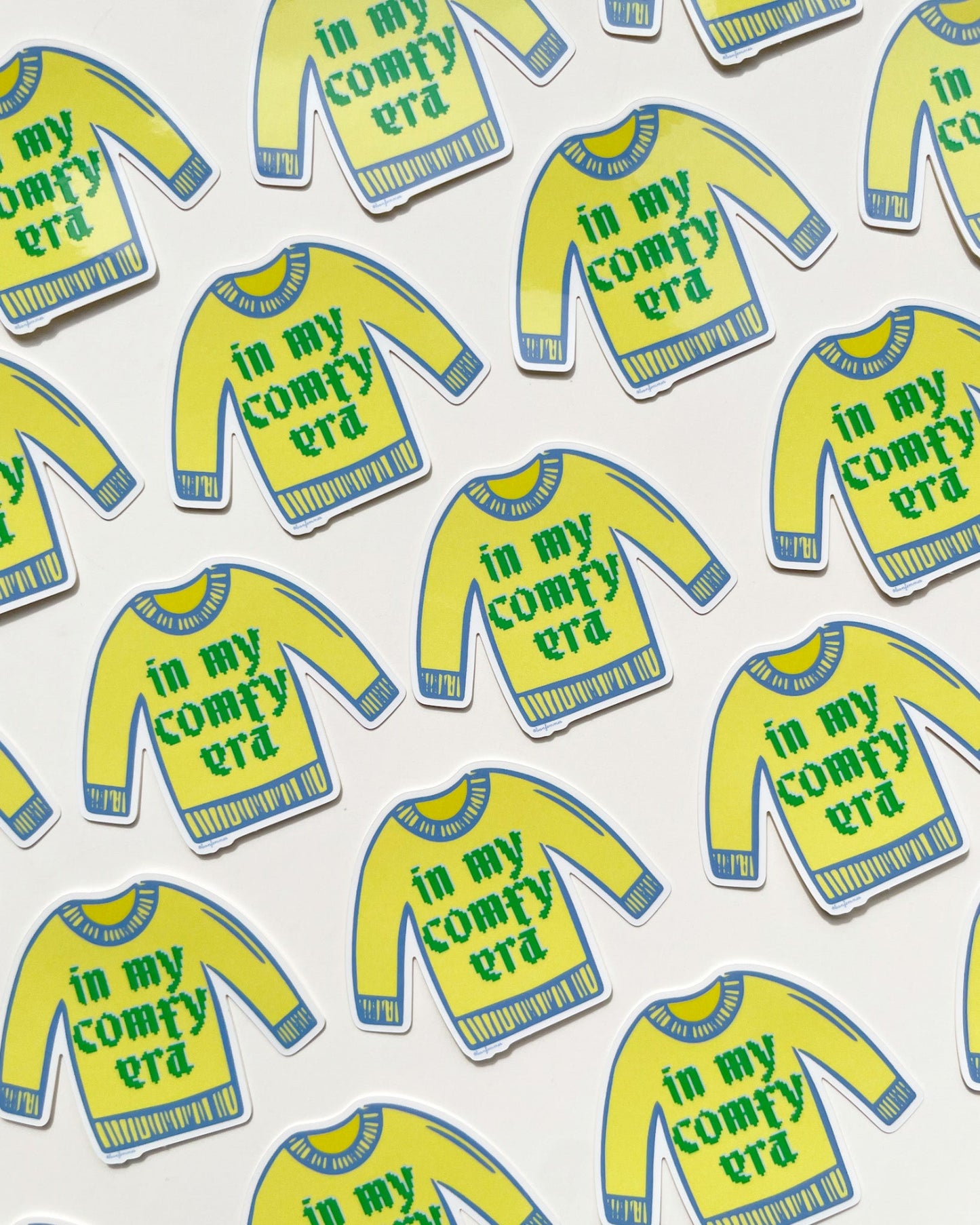 Stickers of a yellow sweater with text 'in my comfy era' on a white background, Comfy Era Sweater Sticker Bon Femmes