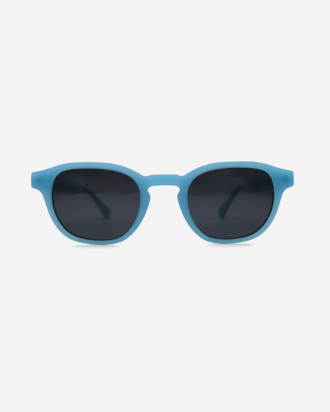 Blue sunglasses with dark lenses on a white background