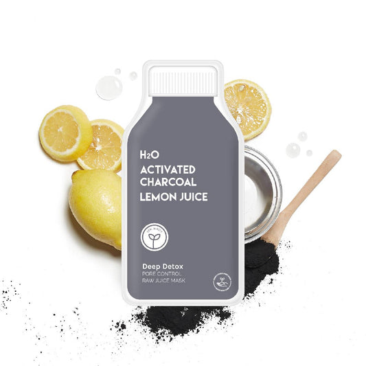 H2O Activated Charcoal Lemon Juice face mask with lemons and black powder on a white background