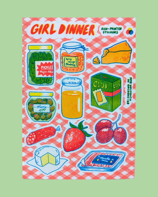 Sticker sheet titled 'Girl Dinner' with various food illustrations on a pink and white checkered background. Girl Dinner Risograph Sticker Sheet