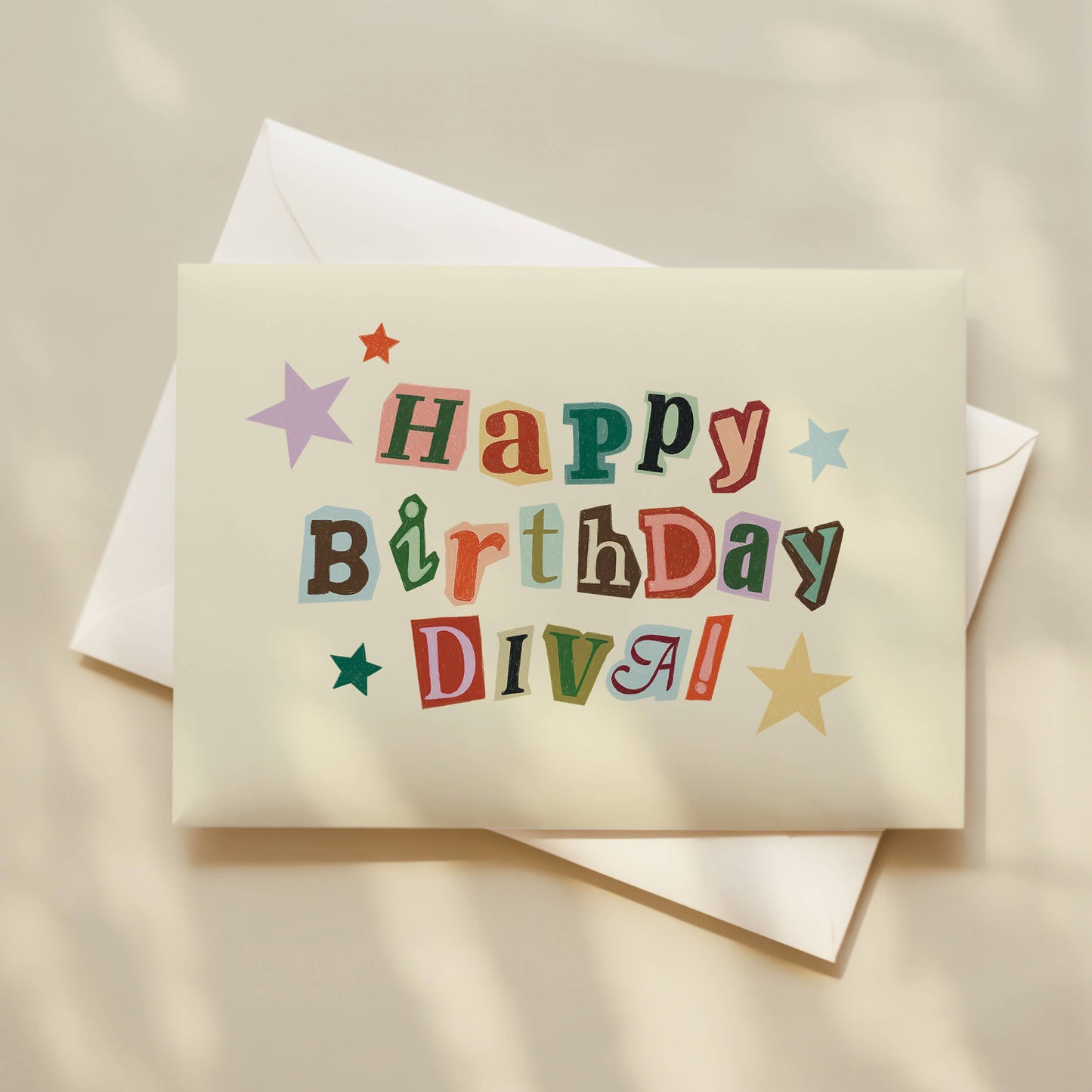 Greeting card with 'Happy Birthday Diva!' text on a beige background