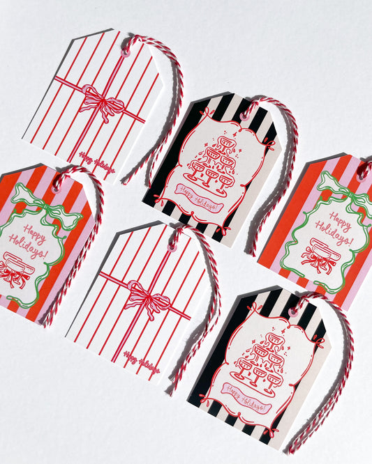 Set of decorative gift tags with red, black, and white designs on a light gray background. Happy Holidays Gift Tag Set of 6