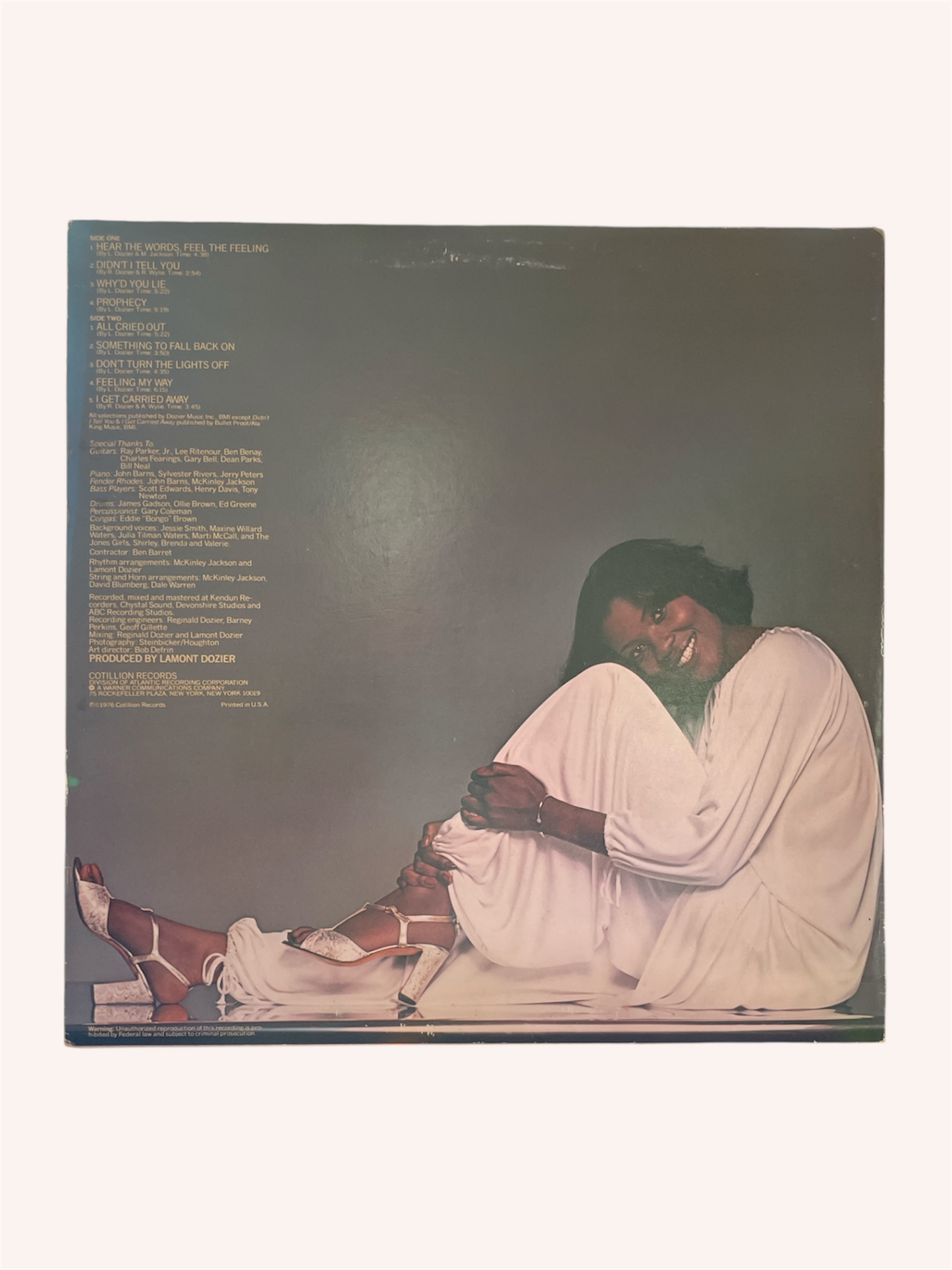 Vinyl record cover with a couple embracing on a white background, Hear the Words, Feel the Feeling Vinyl Record - Margie Joseph