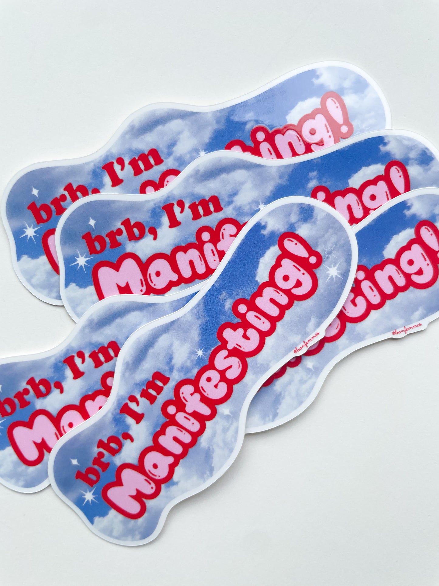 Set of four 'brb, I'm Manifesting!' stickers on a light gray background, Manifesting Cloud Sticker Bon Femmes