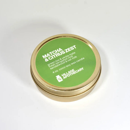 Candle tin labeled 'Matcha & Citrus Zest' from Village Apothecary on a white background, Matcha + Citrus Zest Candle