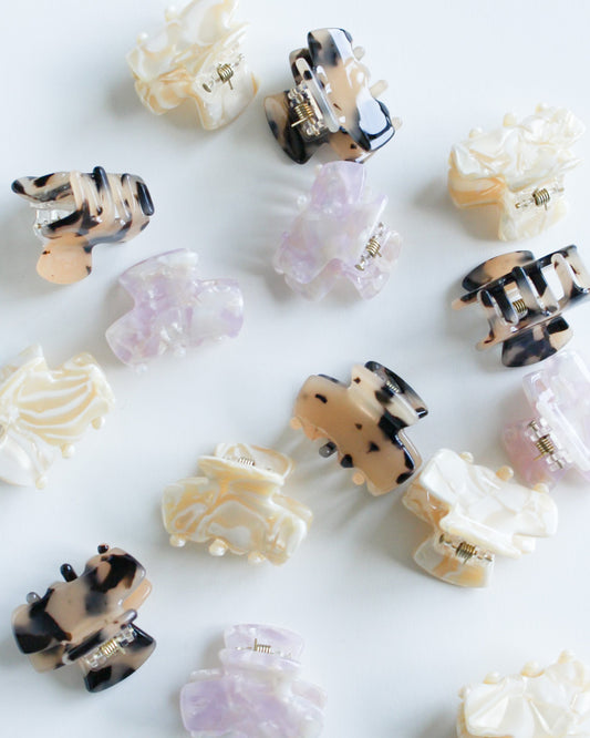 Mini Hair Claw Clip Set of marble-patterned hair clips on a white background