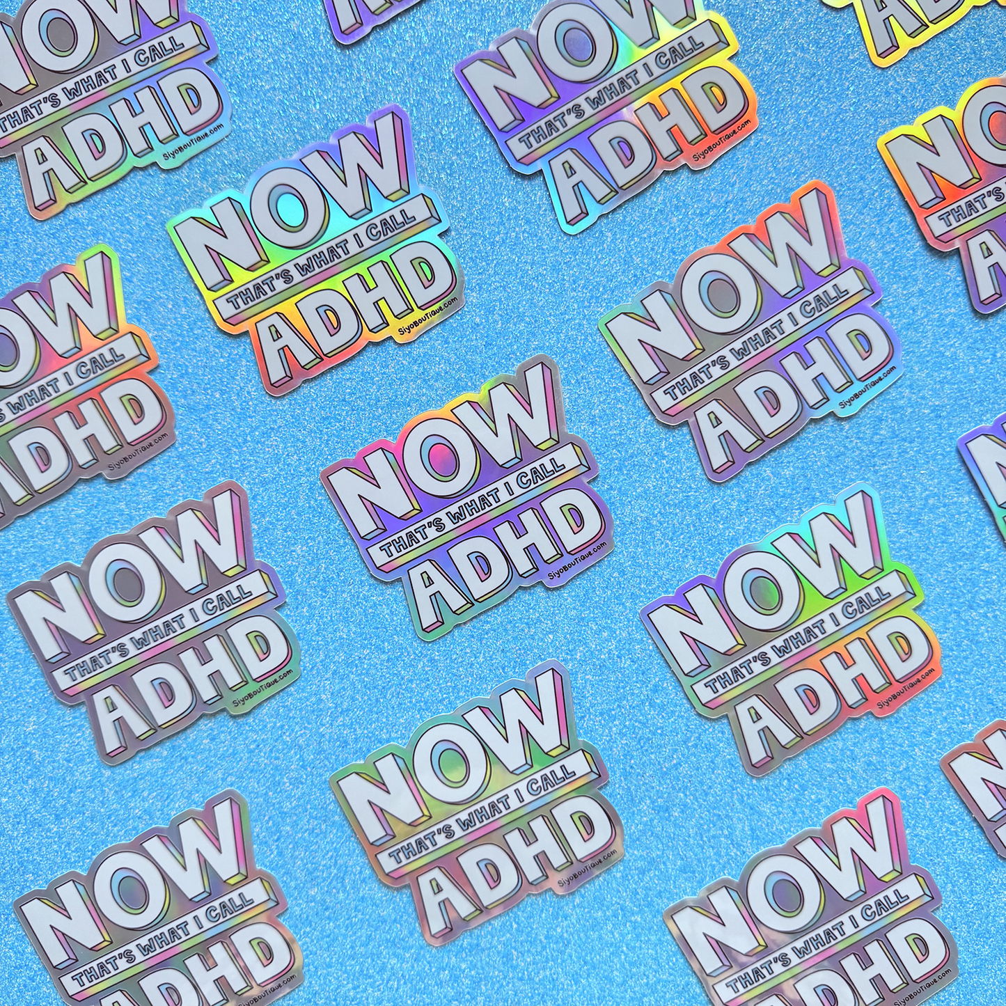 Pattern of 'NOW THAT'S WHAT I CALL ADHD' stickers on a blue background, Now Thats What I Call ADHD Holographic Sticker