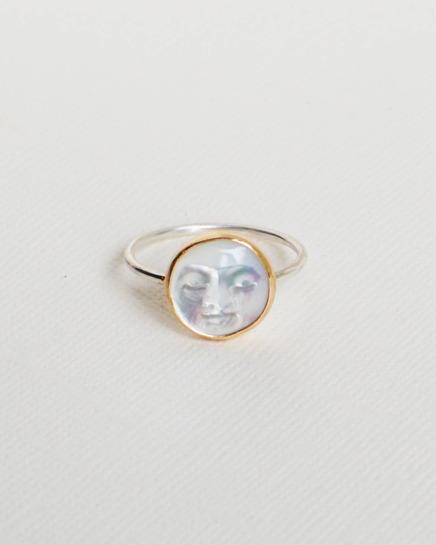Silver ring with a round, with moon face mother of pearl