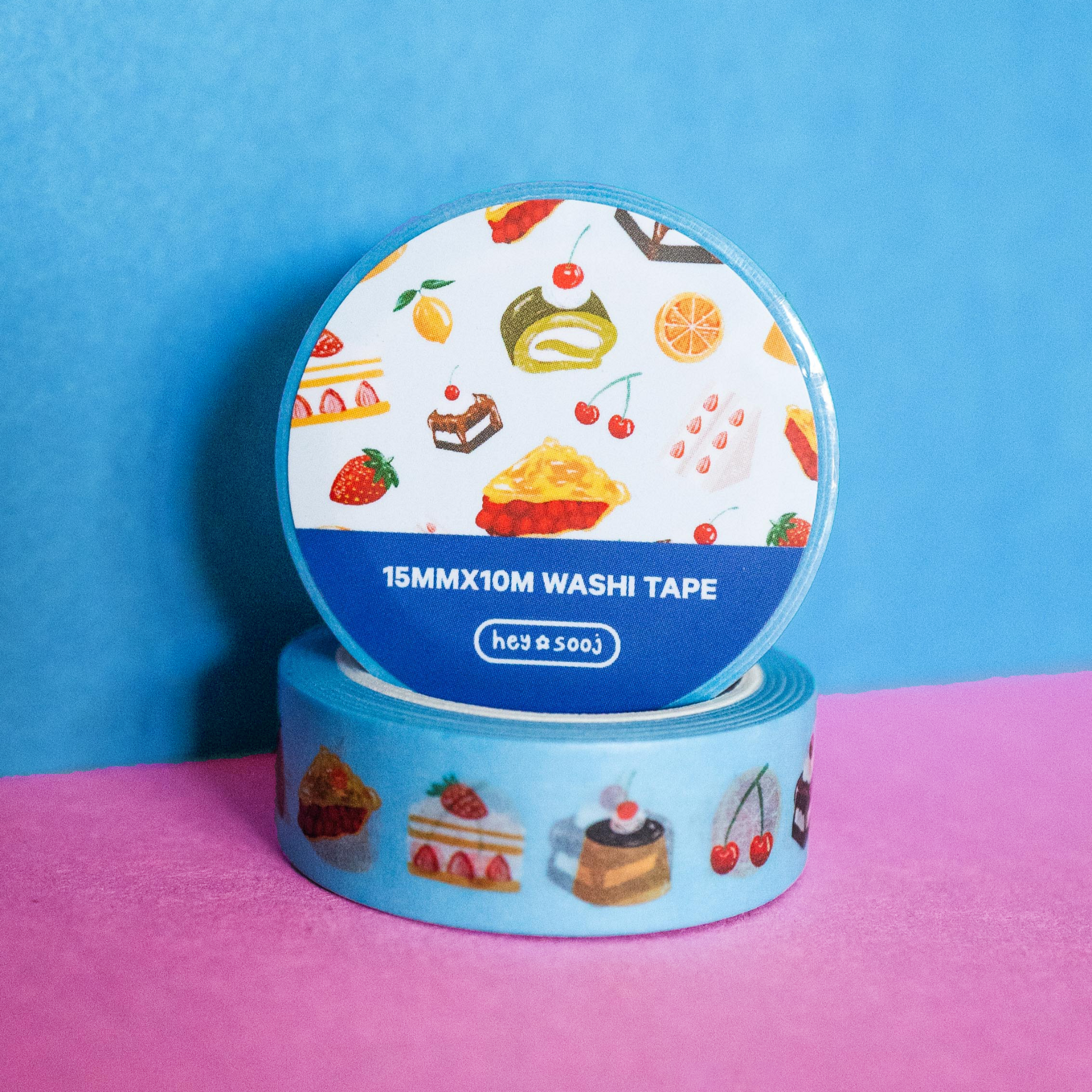 Two rolls of washi tape with colorful designs on a blue and pink background, Sweet Tooth Washi Tape