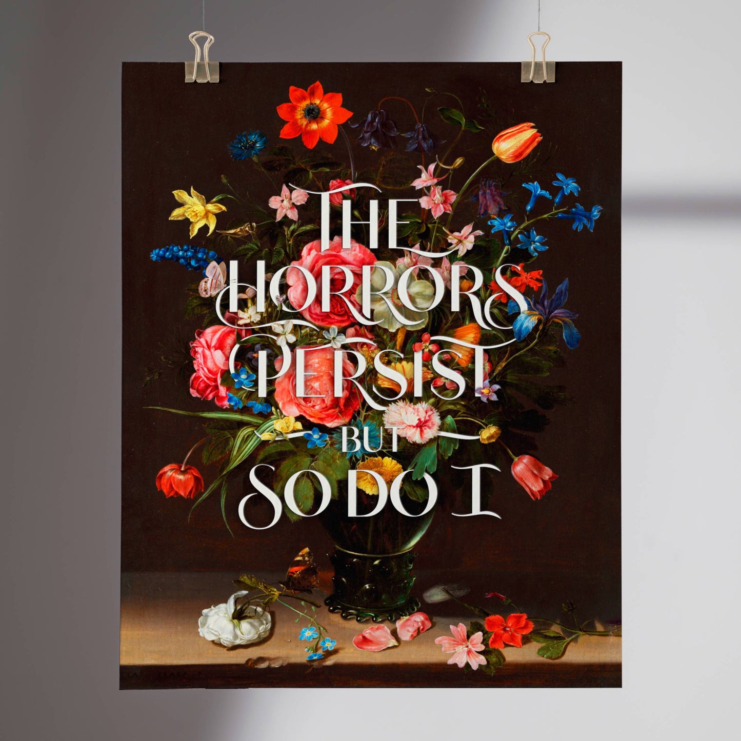 Poster with floral design and text 'The horrors persist but so do I' on a dark background.