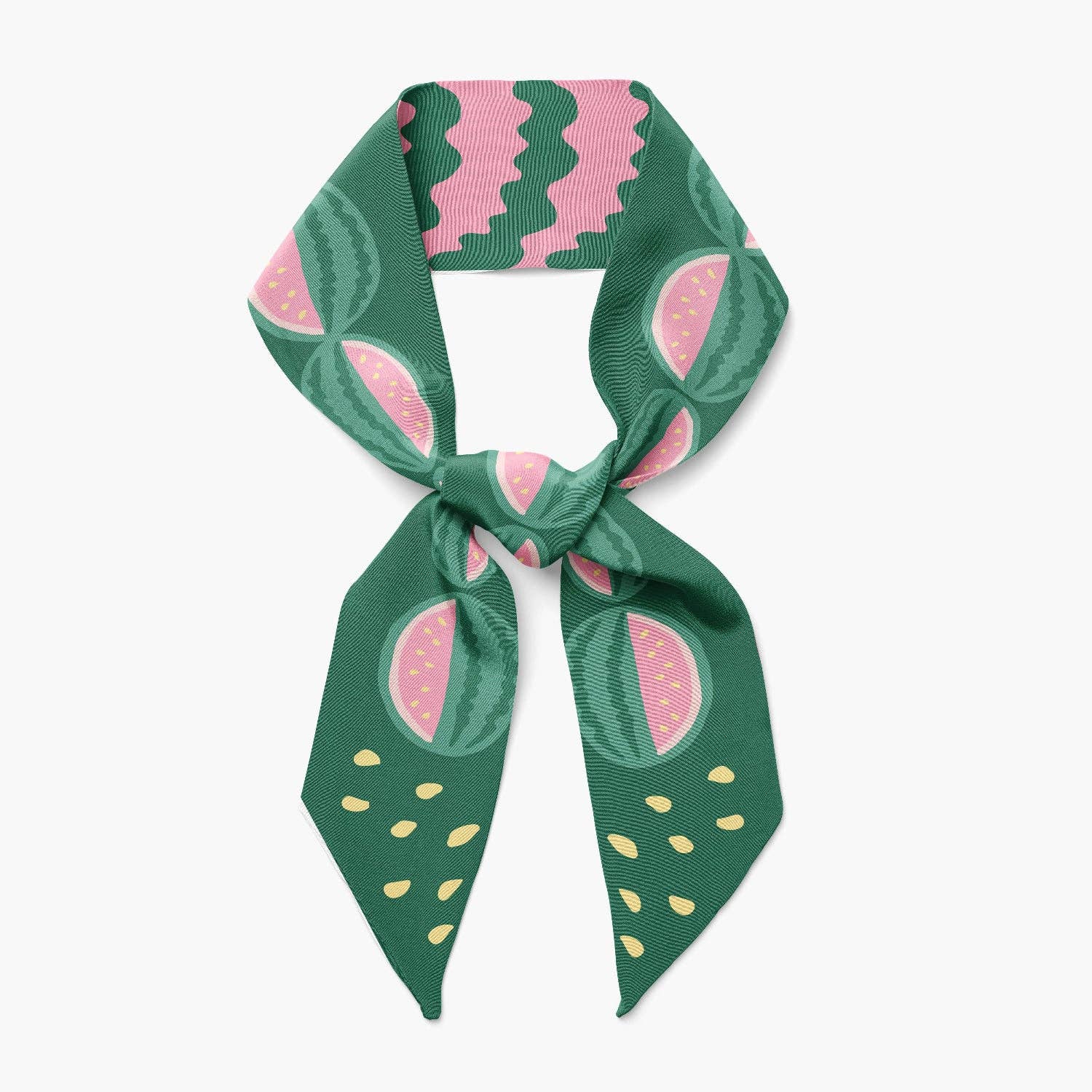 Green and pink patterned scarf on a white background