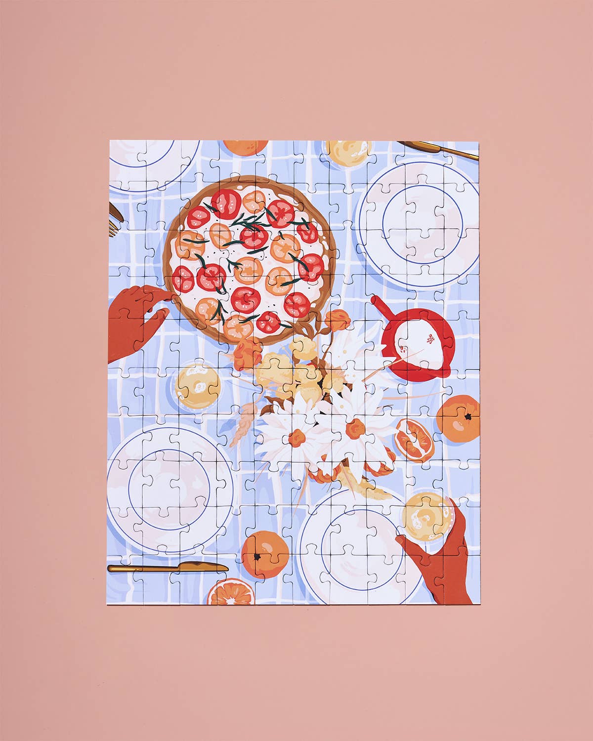 Jigsaw puzzle with a pizza design on a pink background