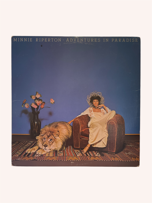 Album cover with a woman, lion, and vase on a blue background, Adventures in Paradise Vinyl Record - Minnie Riperton