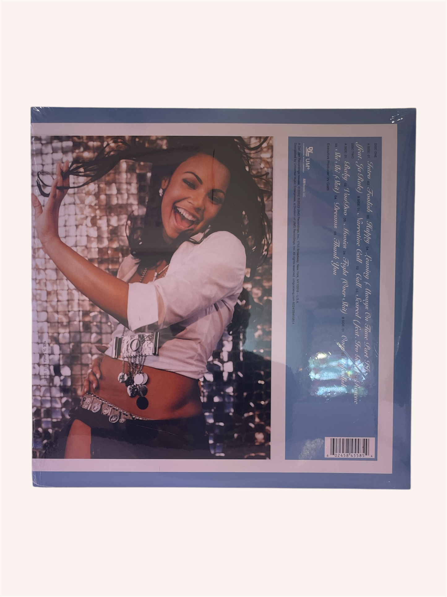 Vinyl record with a person on the cover, featuring a blue border and text. Ashanti Vinyl Record - Ashanti
