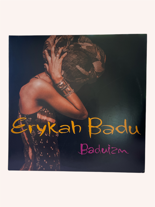 Album cover of 'Baduizm' by Erykah Badu with a person wearing a headscarf. Baduizm Vinyl Record - Erykah Badu