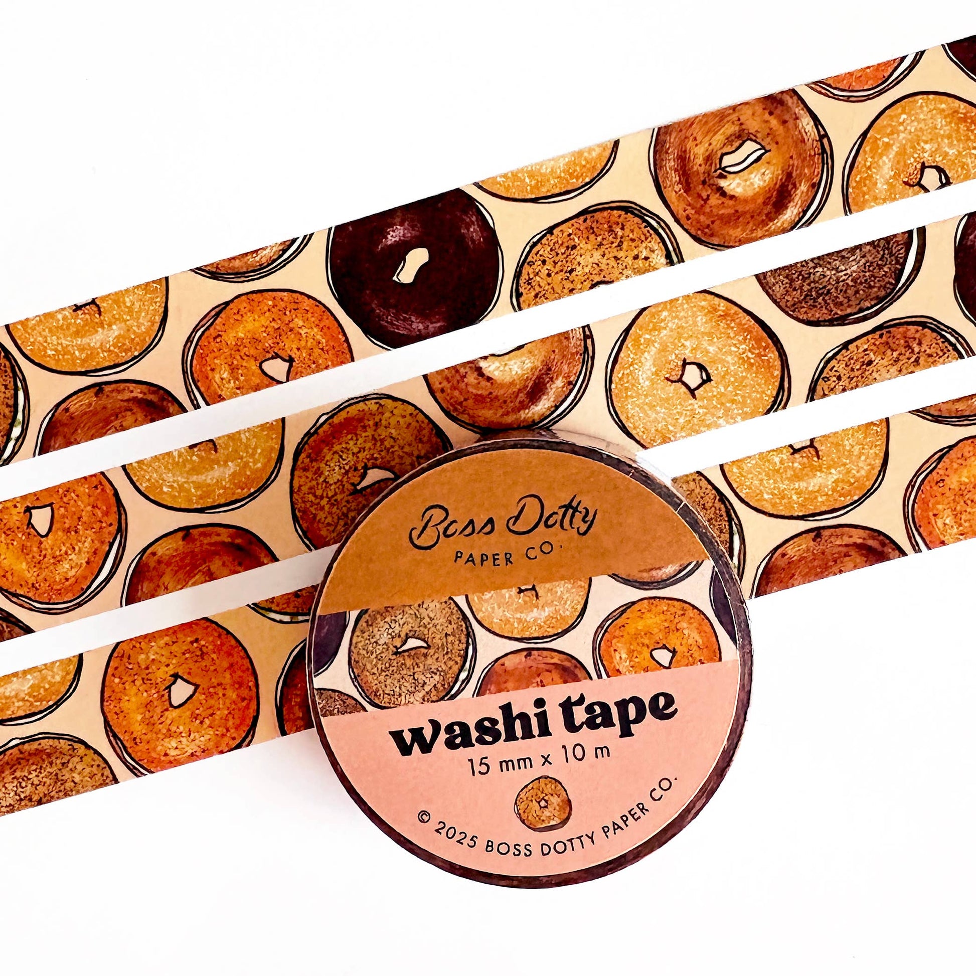 Washi tape with donut pattern and 'Boss Dotty Paper Co' branding on a white background