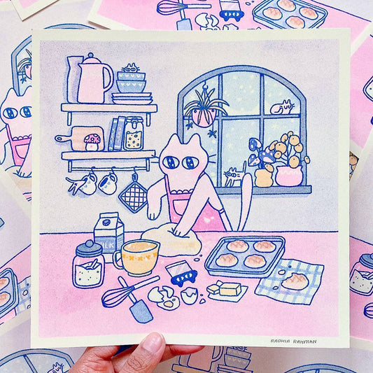 Baking Kuni Riso Art Print, Illustration of a cat baking in a kitchen with a pink background