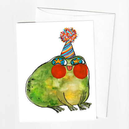 Colorful frog illustration wearing a party hat on a white background
