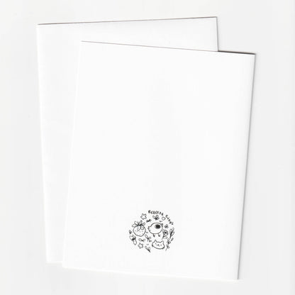 Two white sheets of paper with a black logo on a white background