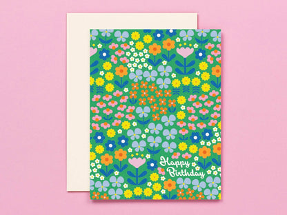 Floral birthday card with 'Happy Birthday' text on a pink background