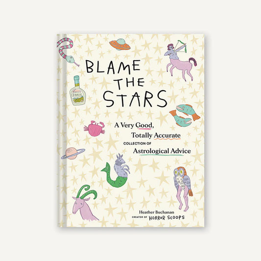 Book cover of 'Blame the Stars' with astrological designs on a light background