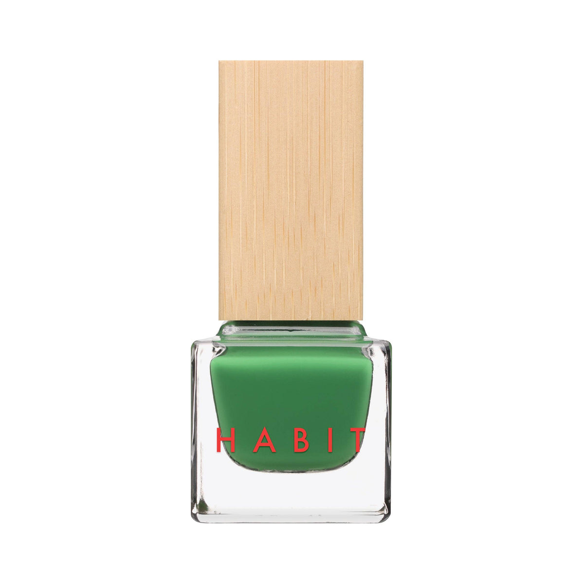 A bottle of green nail polish with a light wood-grain textured cap, featuring the brand name 'HABIT' in red text on the clear glass bottle, set against a plain white background.