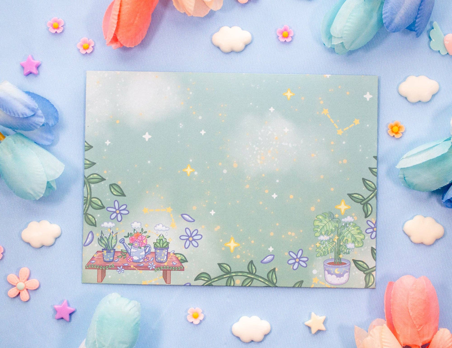 Decorative paper with illustrations of plants and flowers on a colorful background