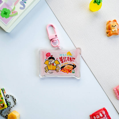 Small pouch with cartoon character and food illustration on a light blue surface