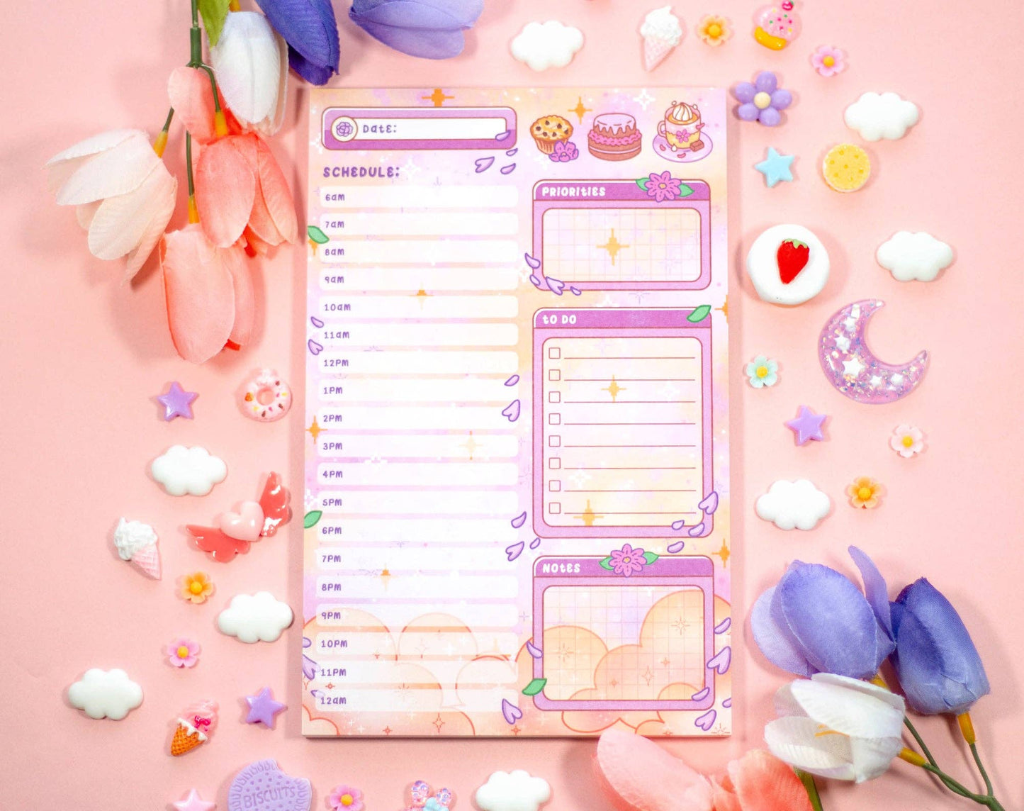 Colorful planner sheet with decorative elements on a pink background