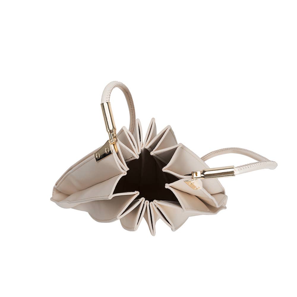 Beige handbag with star-shaped design on a white background, Carrie Pleated Shoulder Bag, Melie Bianco