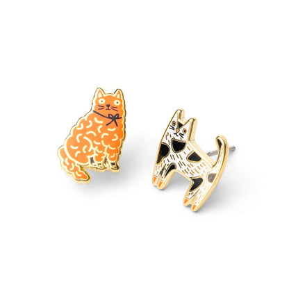 Cat-shaped earrings on a white background