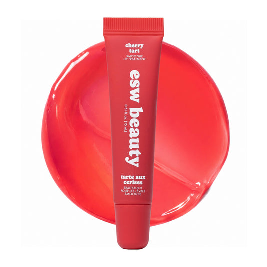 Red lip balm tube with 'esw beauty' branding on a white background