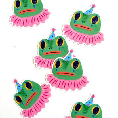 Five cartoonish frog stickers with pink tutus and party hats on a white background
