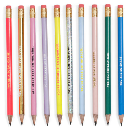 Set of colorful pencils with motivational text on a white background