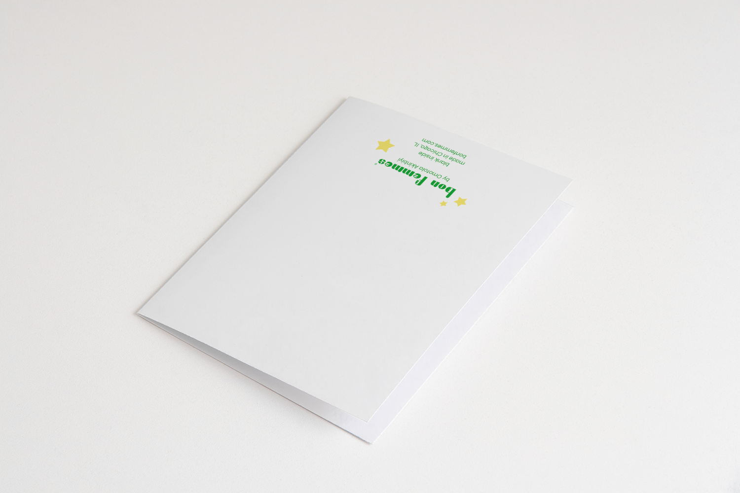 White greeting card with green text on a white background, Congrats Lovebirds Greeting Card bacl