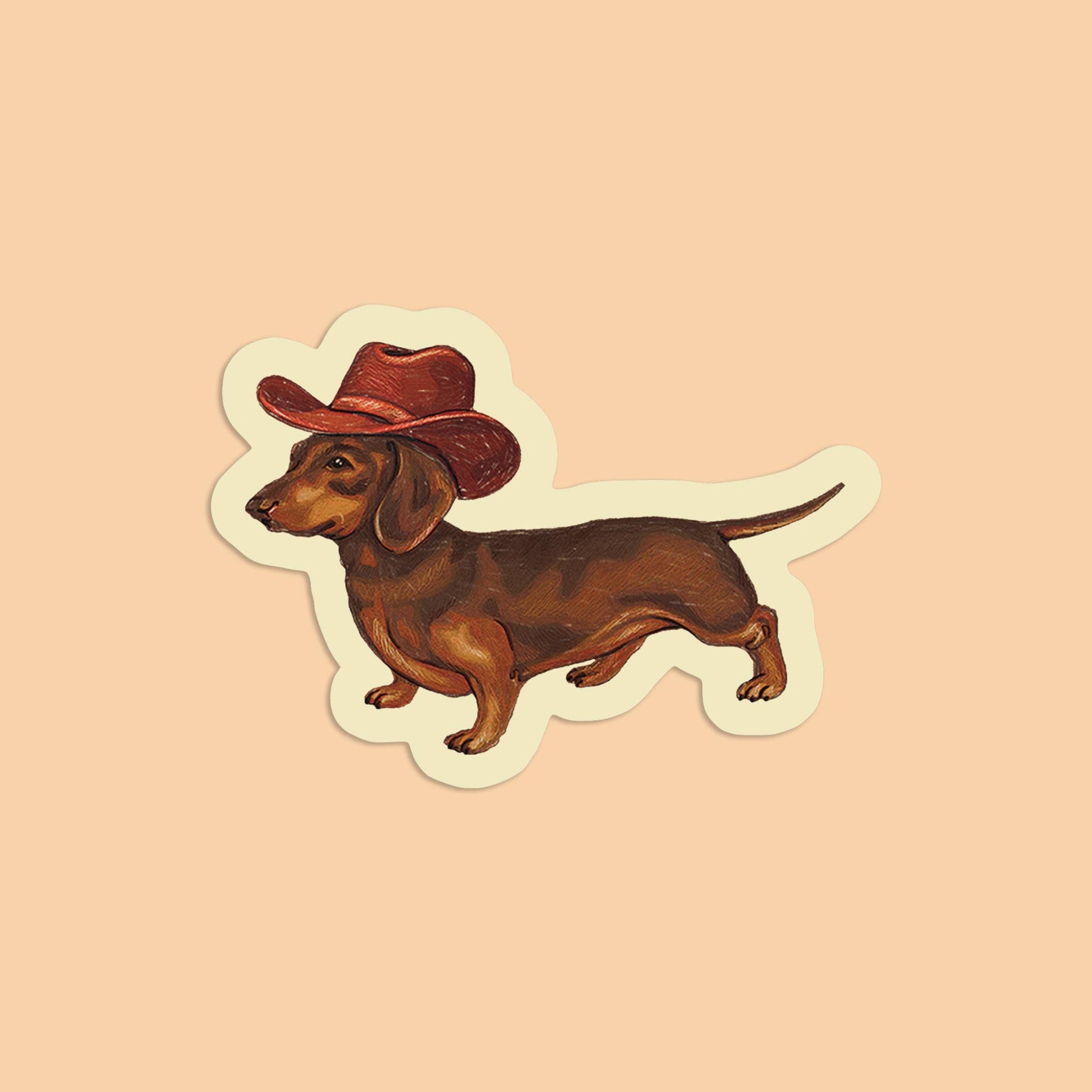 Sticker of a dachshund wearing a cowboy hat on a beige background