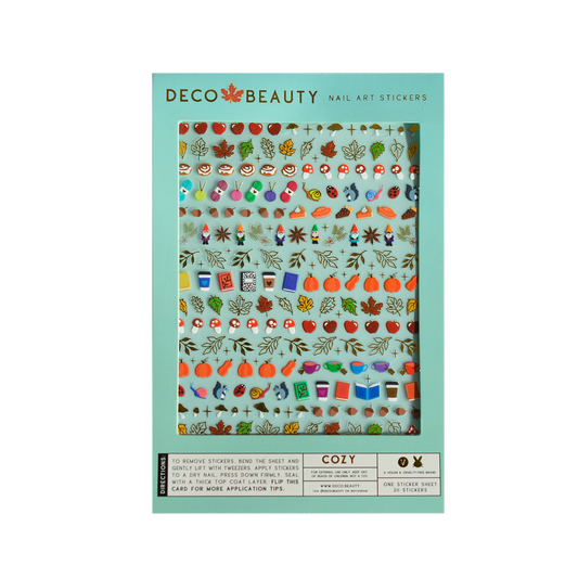 Deco Beauty nail art stickers with autumn-themed designs on a teal, background, Cozy Fall Nail Art Stickers