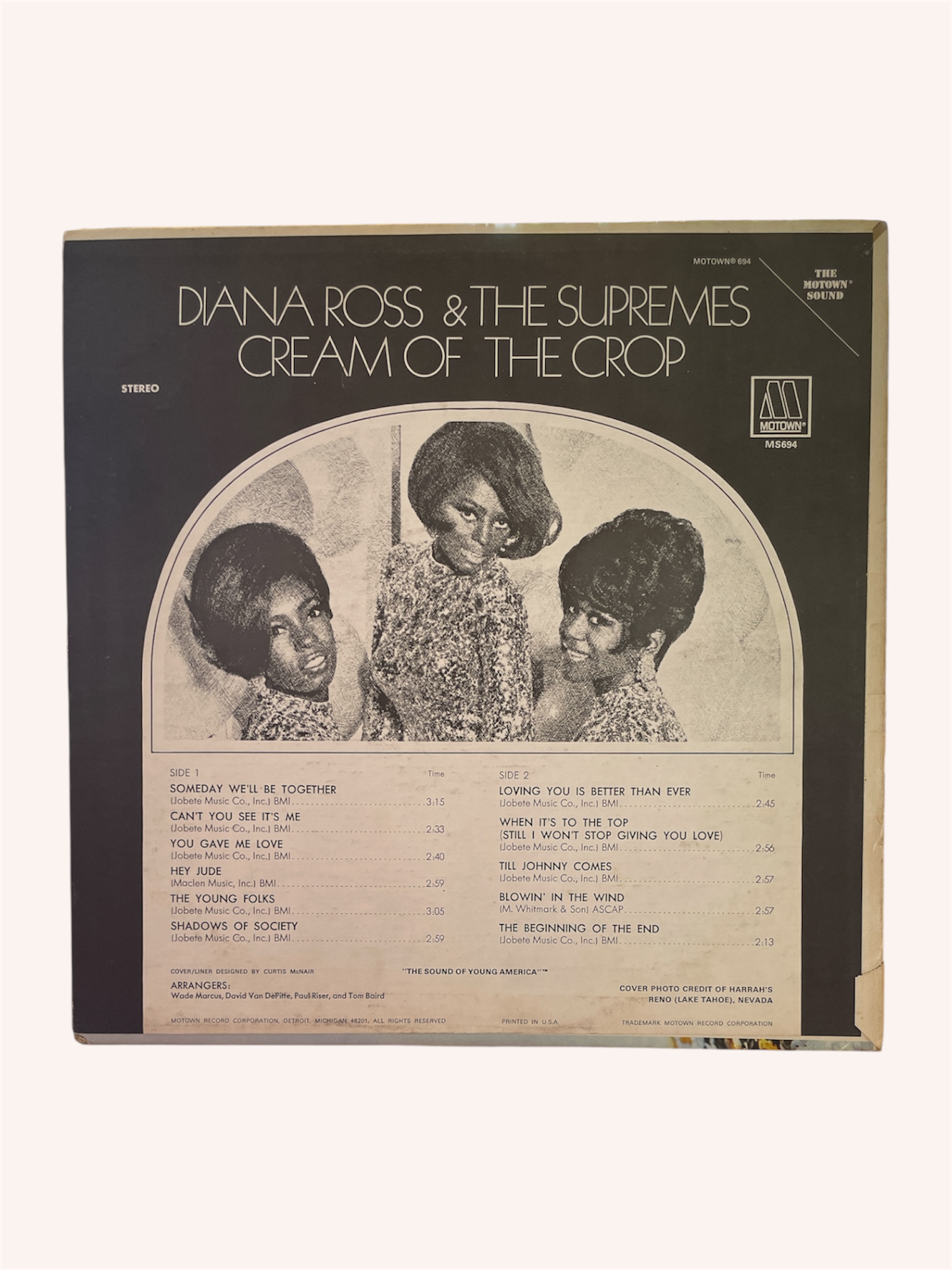 Album cover of 'Cream of the Crop' by Diana Ross & The Supremes with black and white photo of three women. Cream of the Crop Vinyl Record - Diana Ross & the Supremes