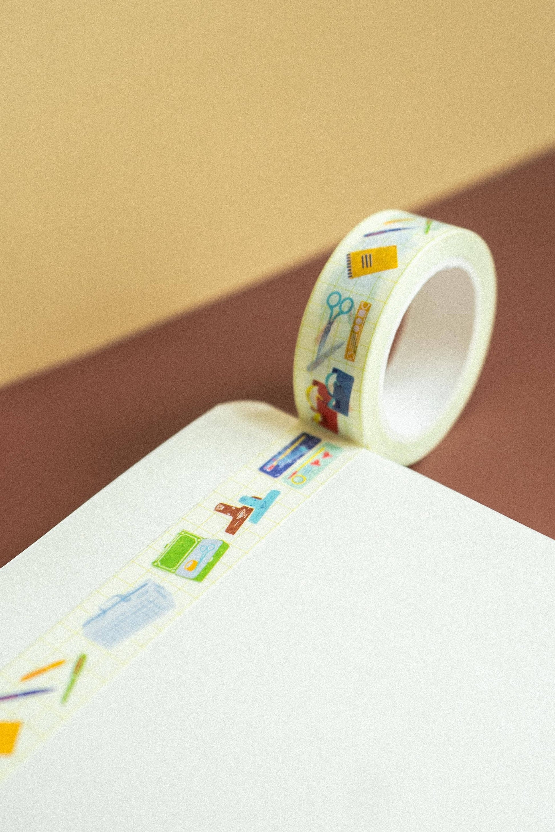 Decorative tape with colorful designs on a plain background