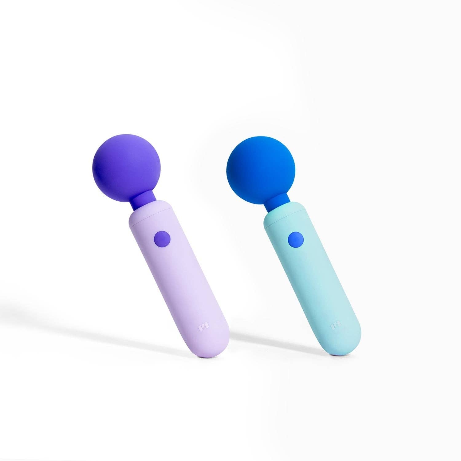 Two handheld massagers, one purple and one blue, on a white background