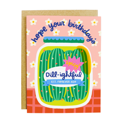 Birthday card with a jar of pickles design and text on a pink background