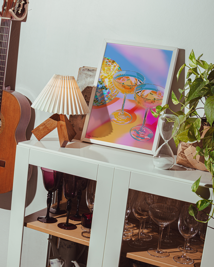 White cabinet with a guitar, lamp, and colorful painting on a white wall.