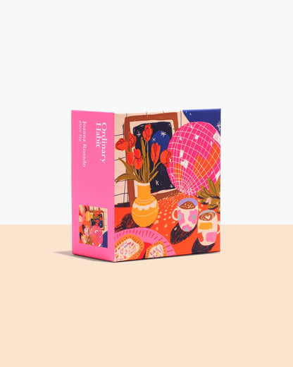 Colorful box with illustrations of a cozy living room scene on a beige background