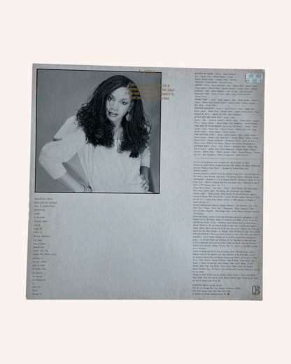 Vinyl record cover with a photo of a person on the left and text on the right. Echoes & Images Vinyl Record - Sylvia St. James