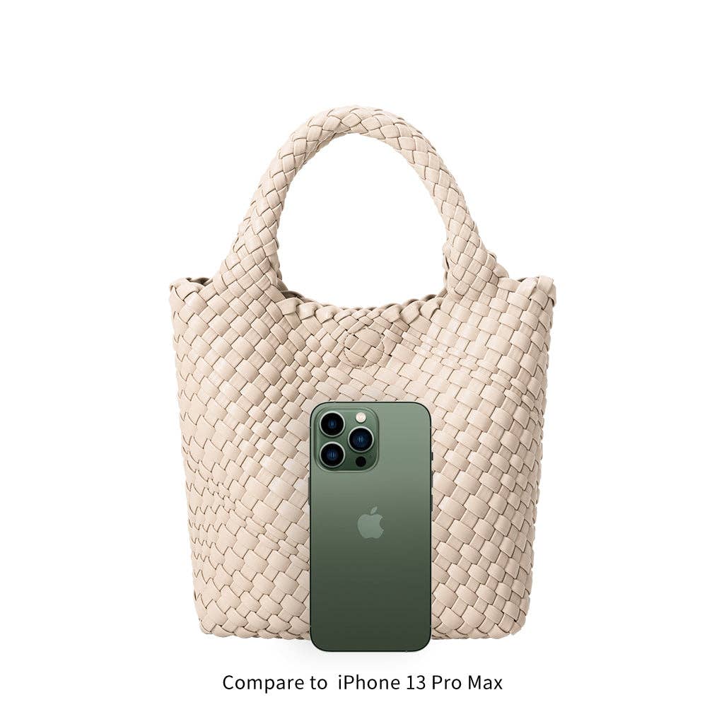 Beige woven handbag with a phone inside, size comparison text at the bottom