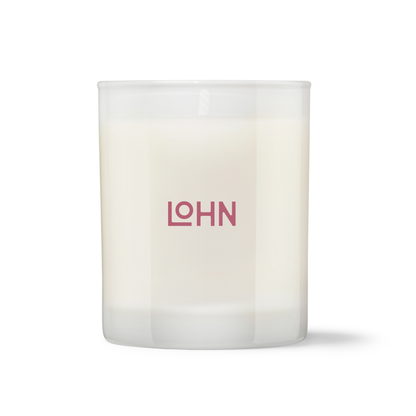 White candle with 'LOHN' logo on a white background