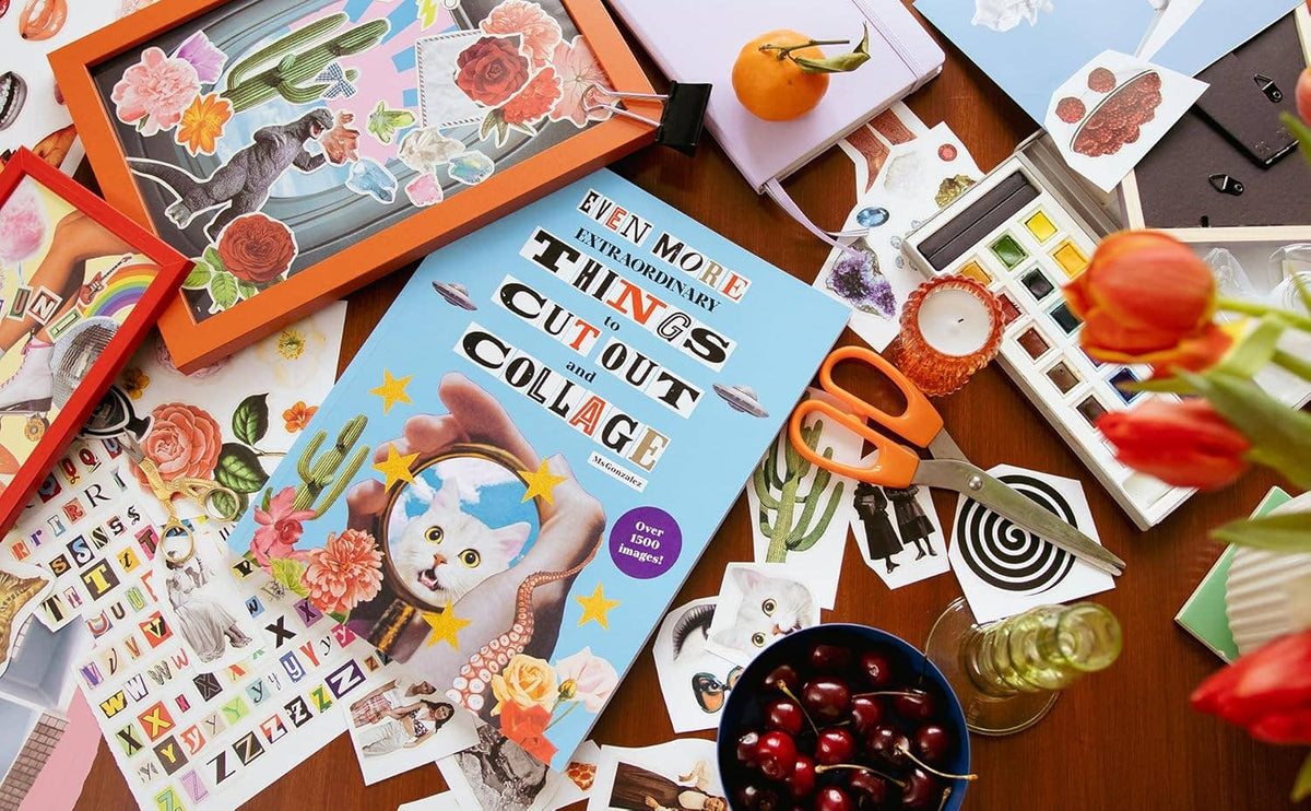 Collage of cut-out art projects and materials on a table
